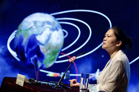 Zhang He, executive director of the Chang'e 4 probe project, shares her experience during a lecture at Hong Kong Polytechnic University on Thursday. EDMOND TANG/CHINA DAILY